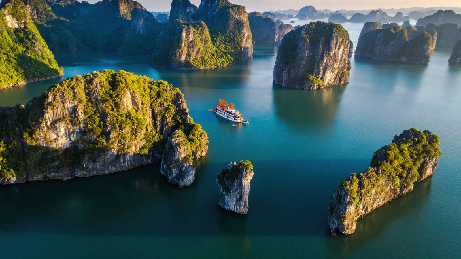 Boats among the limestone islands of Ha Long Bay