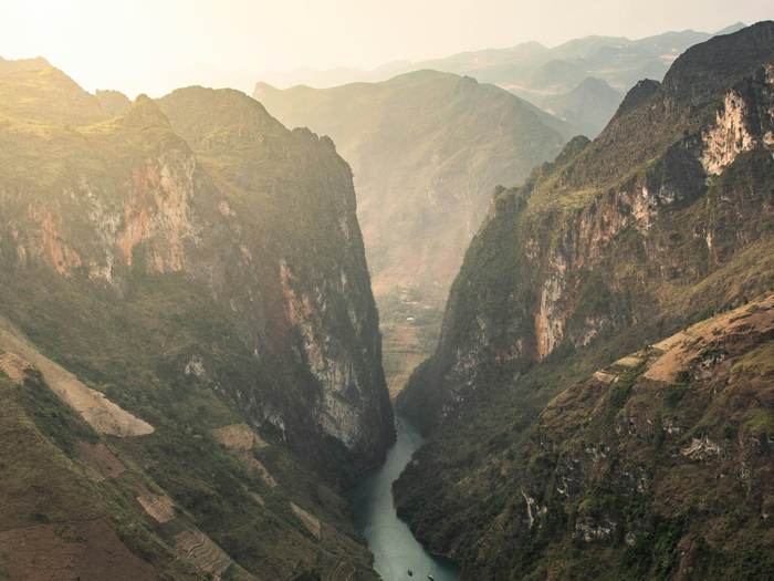 The emerald Nho Que river winding through the Ha Giang canyon